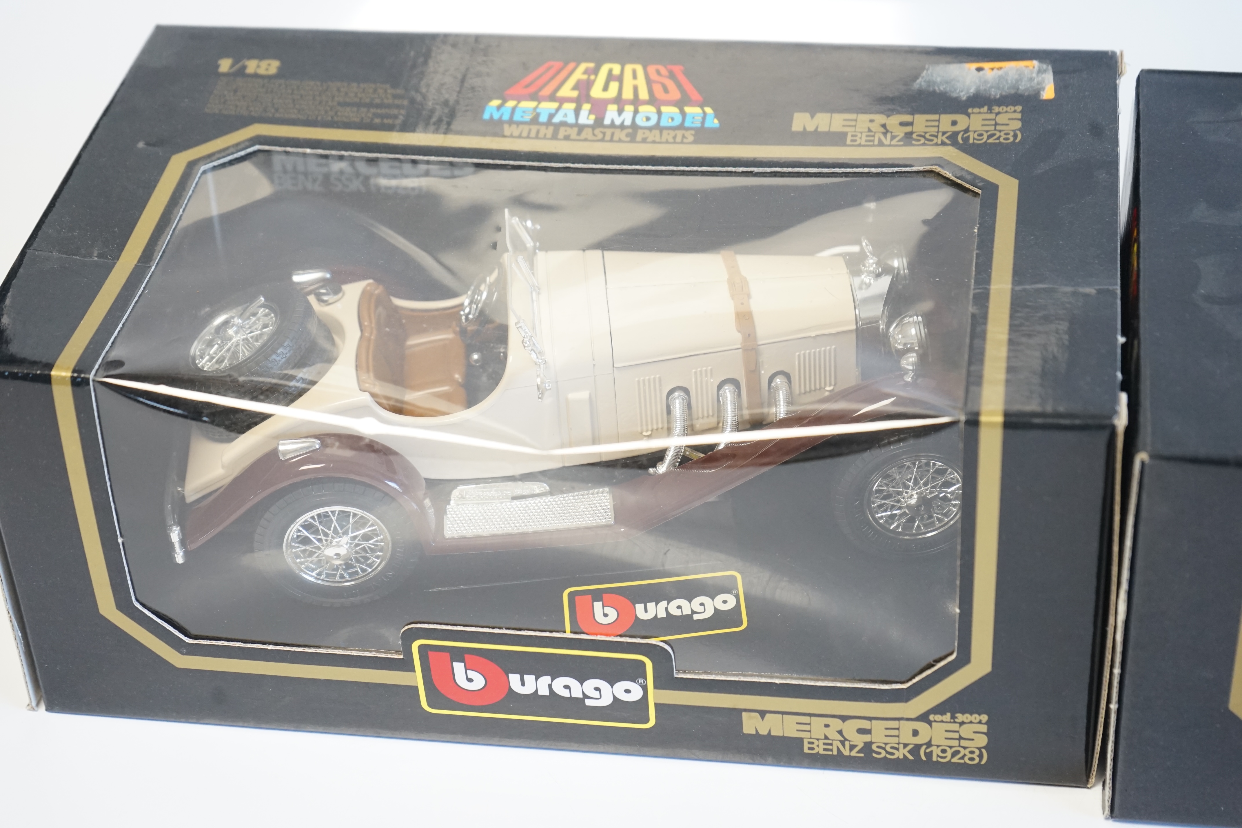 Six boxed Burago Diecast racing cars, five in 1/18 scale including; a Mercedes-Benz SSK, a Mercedes-Benz 300SL, a Jaguar SS100, a Lancia Aurelia B24 spider and an Alfa Romeo 2300 spider, together with a 1/24 scale Ford A